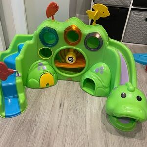Fisher-Price Vintage Drop and Roar Dinosaur with Balls